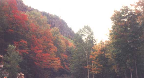 Autumn photo of Frankenstein cliffs as seen from the Arethusa Falls/Frankenstein Cliffs trailhead (photo by Webmaster)