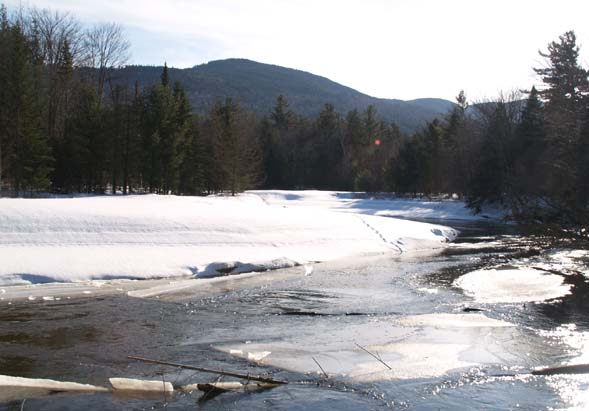 Swift River, animal tracks, and mountains (photo by Webmaster)