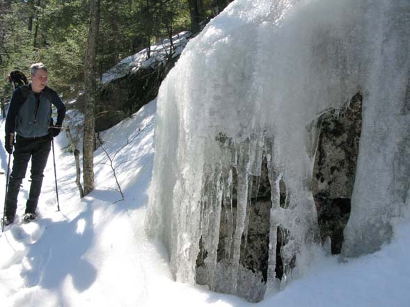 Dennis at an icy boulder (photo by Mark Malnati)