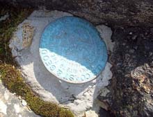 Benchmark on Owl's Head (photo by Alex Clogston)