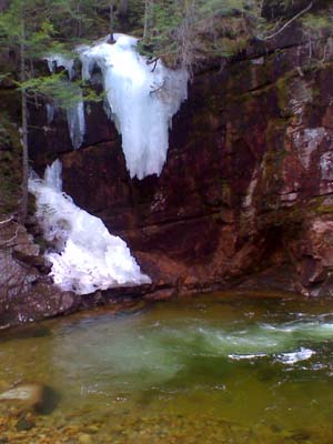 Pool at Sabbaday Falls with some snow on the ledges (photo by Bill Mahony)