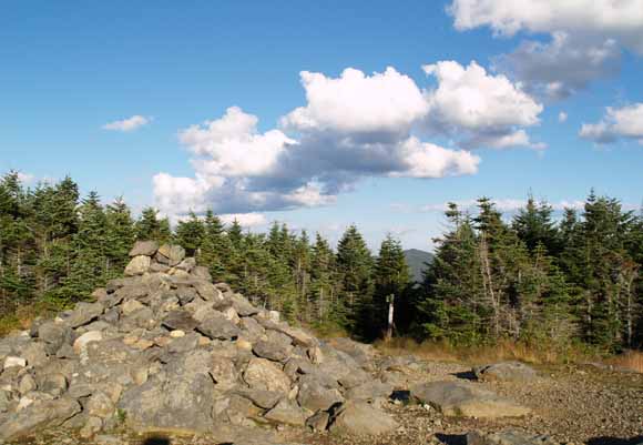 Mt. Hale summit cairn with Hale Brook Trailhead in the background (photo by Webmaster)