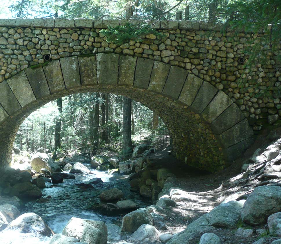 North side of the cobblestone bridge with the hiking trail going under the right side of the bridge (photo by Chip Lary)